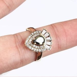 Emerald & white sapphire crown shield set